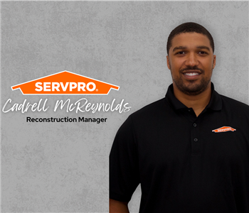 Servpro employee, man in black polo