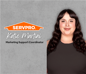 Servpro employee, woman in black polo